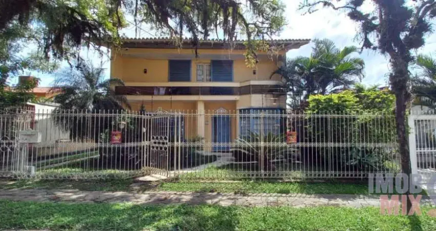 Casa com 3 quartos à venda na Travessa Trindade, 40, Jardim Lindóia, Porto Alegre