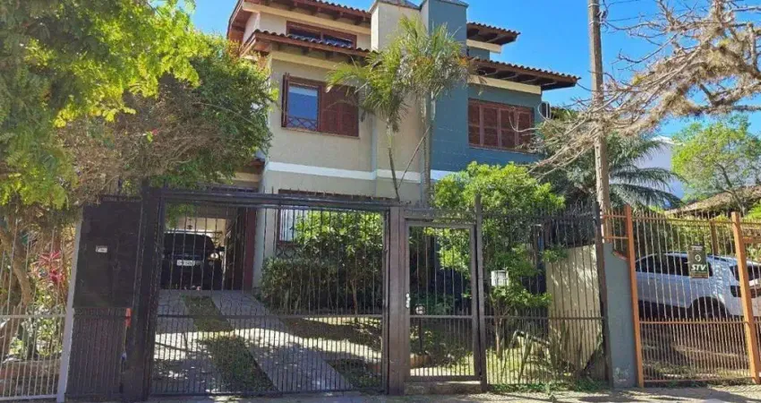 Casa com 3 quartos à venda na Rua Josué Guimarães, 252, Espírito Santo, Porto Alegre