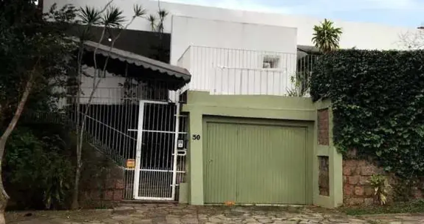 Casa com 4 quartos à venda na Ruperti, 50, Chácara das Pedras, Porto Alegre