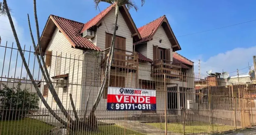 Casa com 3 quartos à venda na Rua Zeferino Dias, 823, Sarandi, Porto Alegre
