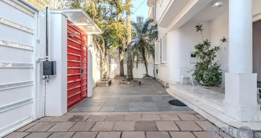 Casa com 5 quartos à venda na Rua Professor Juvenal Miler, 80, Rio Branco, Porto Alegre