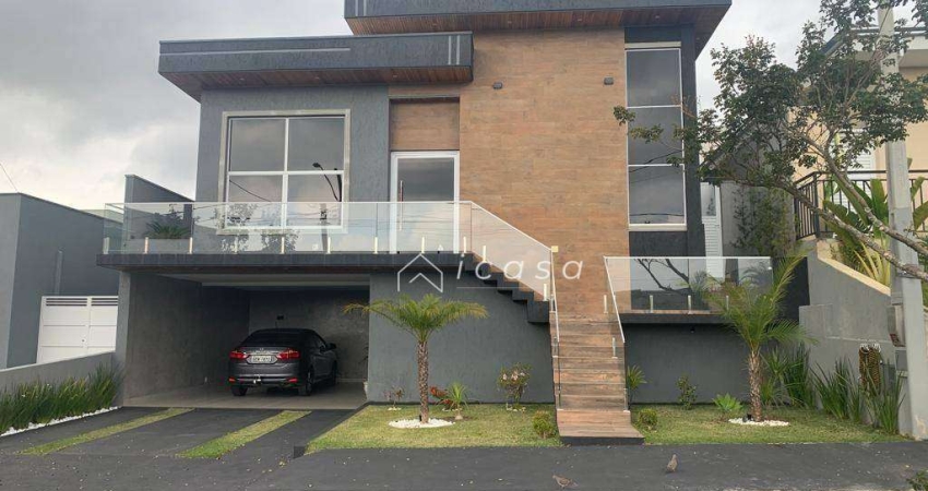 Casa com 3 dormitórios, 200 m² - venda por R$ 1.375.000,00 ou aluguel por R$ 7.456,00/mês - Condomínio Terras do Vale - Caçapava/SP
