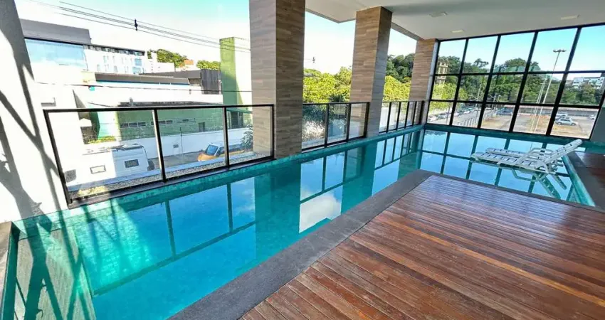 Apartamento à venda no bairro Anita Garibaldi, Joinville/SC.  Sala de estar, jantar, cozinha e sacada com churrasqueira integradas,