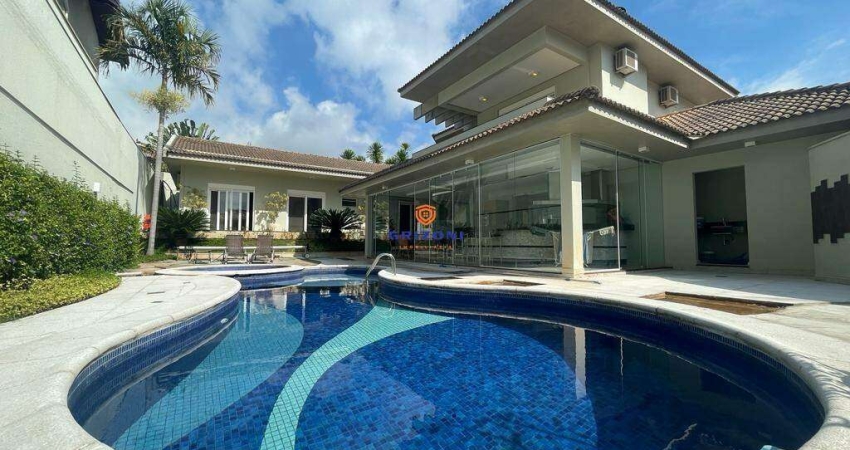 CASA RESIDENCIAL TIVOLI 1 | 5 SUÍTES | 3 SALAS | 7 BANHEIROS | 4 VAGAS