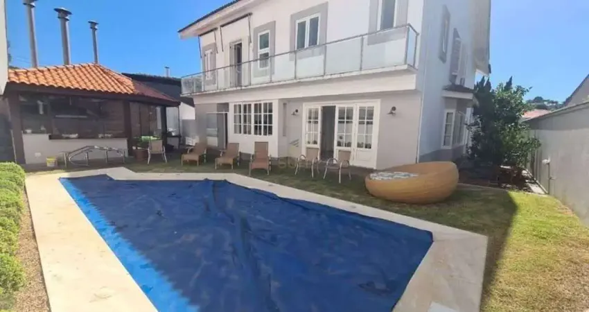 Casa com 4 dormitórios à venda, 598 m² por R$ 4.500.000 - Alphaville Residencial