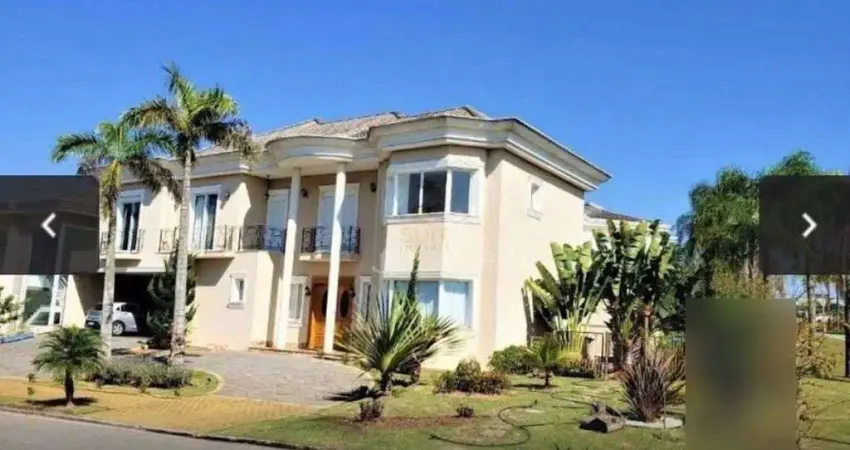 Casa com 5 dormitórios à venda, 618 m² por R$ 4.200.000 - Residencial Doze (Alph