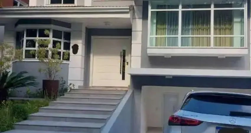 Alphaville 11 - Casa com 421m², 4 Suítes, Piscina, Churrasqueira, Lavabo, Lareir