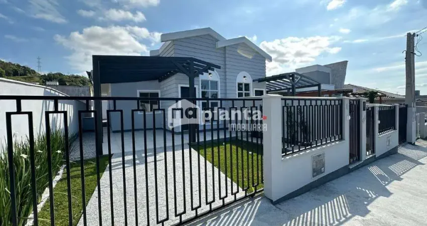Casa à venda no Bairro Fundos em Biguaçu-SC, com 3 quartos, 1 suíte, 1 vaga