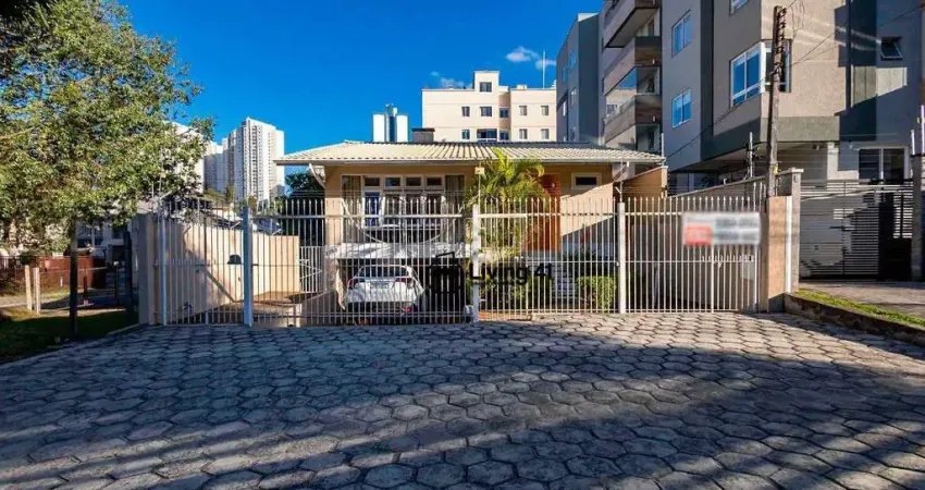 Casa com 4 dormitórios à venda, 298 m² por R$ 1.690.000 - Cristo Rei