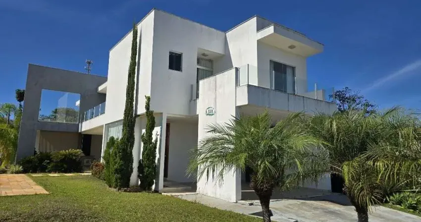 Casa com 3 dormitórios à venda, 410 m² por R$ 2.200.000 - Condomínio Pontal da Liberdade - Lagoa Santa/MG