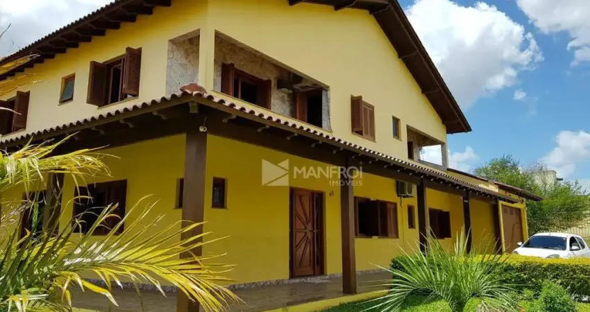 Casa com 5 dormitórios à venda, 509 m² por R$ 1.699.990,00 - Parque Santa Fé - Porto Alegre/RS