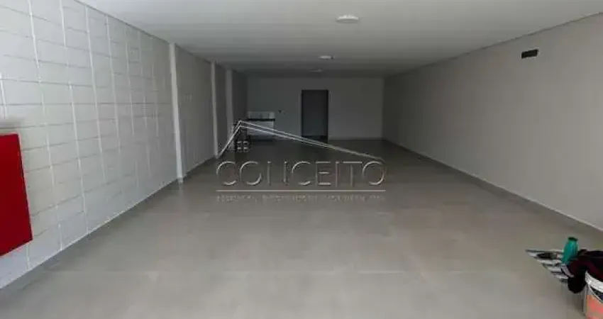 Sala comercial para locação no bairro Vila Rezende com 98 m² | Amplo salão e 2 vagas de estacionamento.