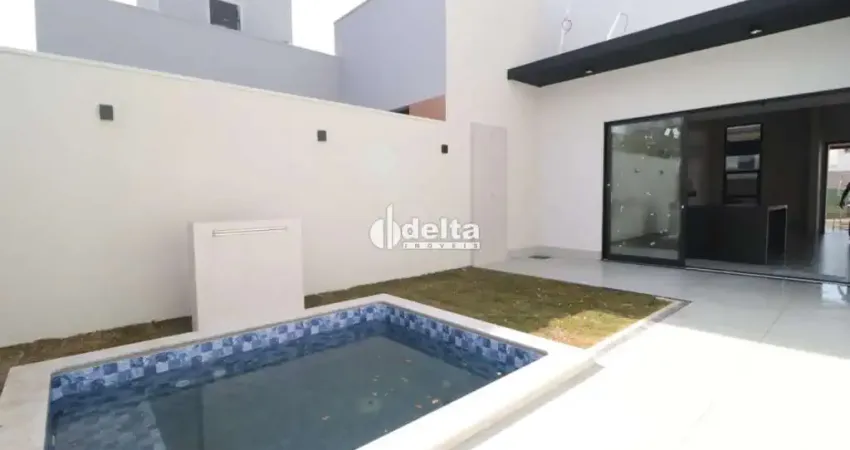Casa residencial em condomínio com 3 suítes disponível para venda no bairro grand ville em uberlândia - mg.