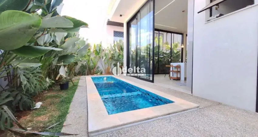 Casa residencial em condomínio com 4 suítes disponível para venda no bairro granja marileusa em uberlândia - mg.