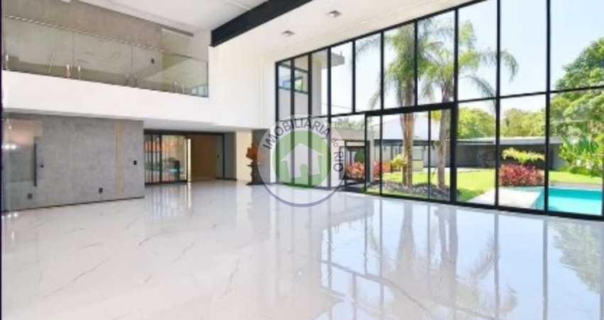 Luxuosa mansão de 5 quartos e 5 suítes na Barra da Tijuca, Rio de Janeiro - RJ: 8 salas, 6 banheiros, 5 vagas, 1.288m²!