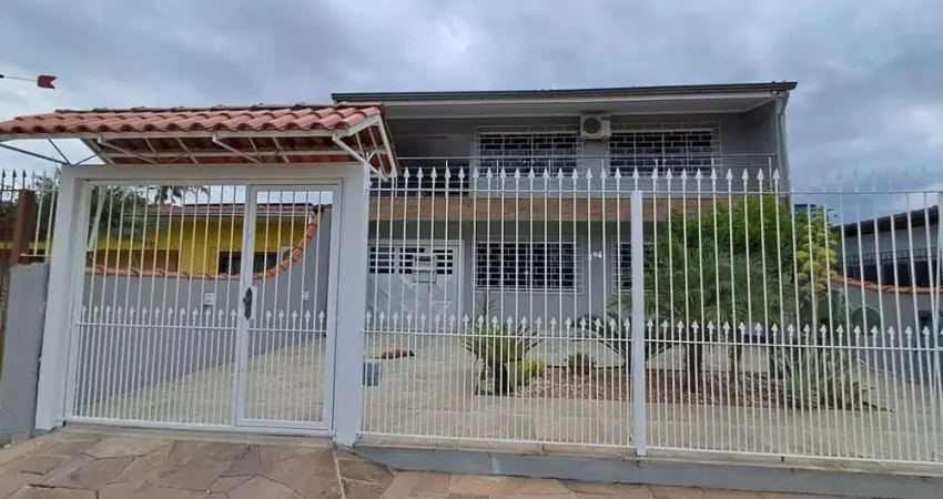 Casa com 3 quartos à venda na Rua Gaspar Martins, 894, Americana, Alvorada