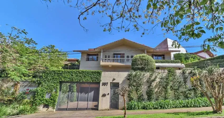 Casa com 4 quartos à venda na Rua Felipe Becker, 357, Três Figueiras, Porto Alegre