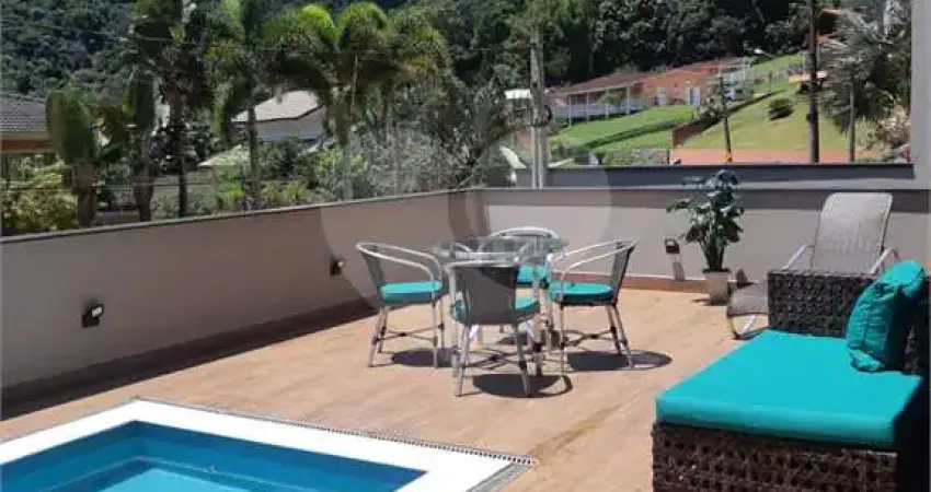 Casa em condomínio fechado com 4 quartos à venda na Rua Sabiá, 1226, Praia da Lagoinha, Ubatuba