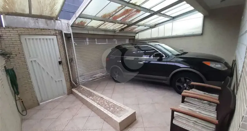 Casa com 4 quartos à venda na Rua Alberto Baccarat, 55, Boqueirão, Santos