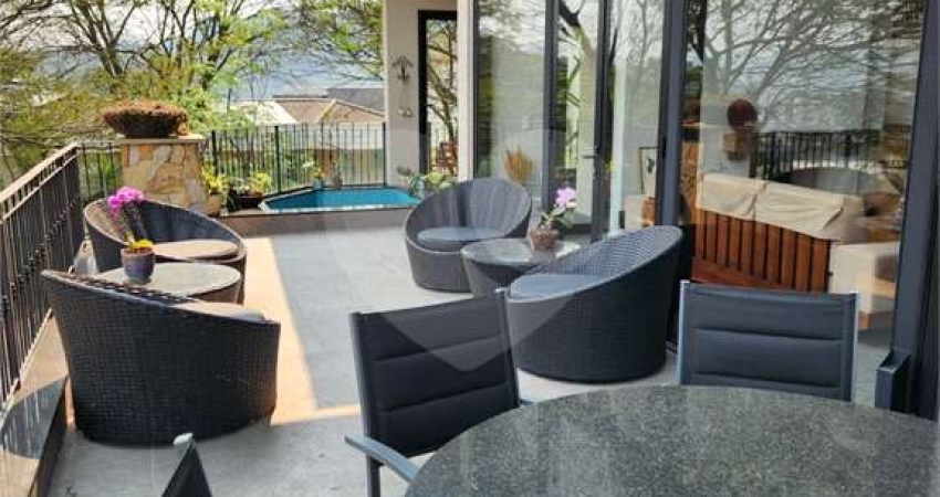 Casa em condomínio fechado com 4 quartos à venda na Alameda das Quaresmeiras, 244, Alphaville, Santana de Parnaíba