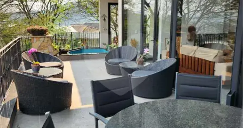 Casa em condomínio fechado com 4 quartos para alugar na Alameda das Quaresmeiras, 244, Alphaville, Santana de Parnaíba