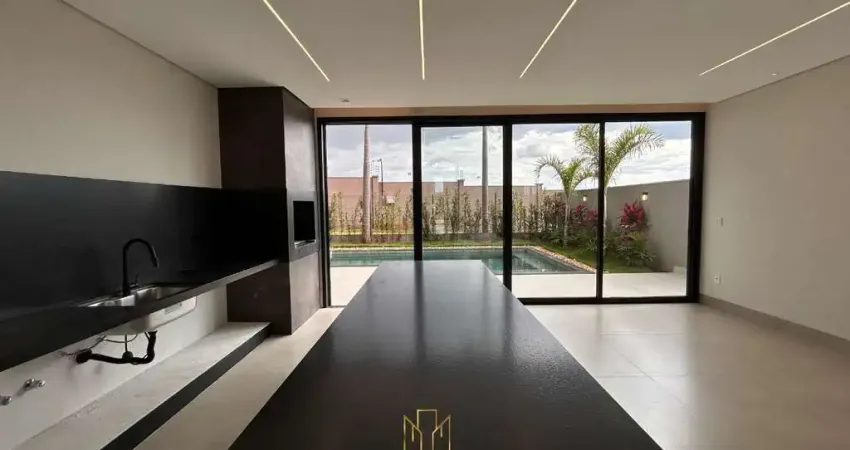 Casa de alto padrão no Condomínio Tamboré à venda em Uberlândia-MG: 4 quartos, 3 suítes, 2 salas, 4 banheiros, 4 vagas, 269,31 m².