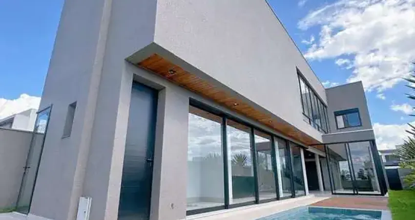 Imperdível! Casa de alto padrão no condomínio Tamboré em Morada da Colina, Uberlândia-MG - 3 quartos, 3 suítes, 1 sala, 4 banheiros, 277m².