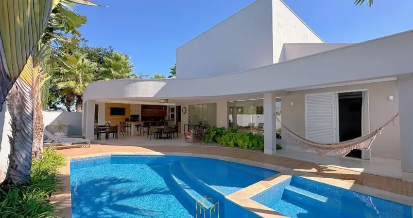 Condomínio Gênova: Luxo e Conforto em Nova Uberlândia, Uberlândia-MG! Casa com 4 Quartos, 4 Suítes, 2 Salas, 6 Banheiros, 4 Vagas de Garagem e 722m² de área!