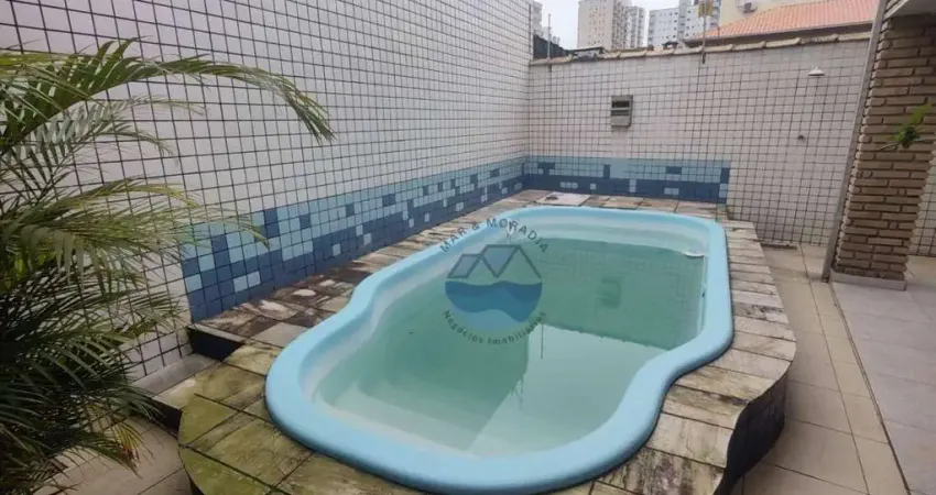 Casa de Cinema com 4 quartos com 2 suítes piscina e churrasqueira com 5 vagas cobertas perto da praia na Aviação em Praia Grande (SP) R$.1.390.000,00.