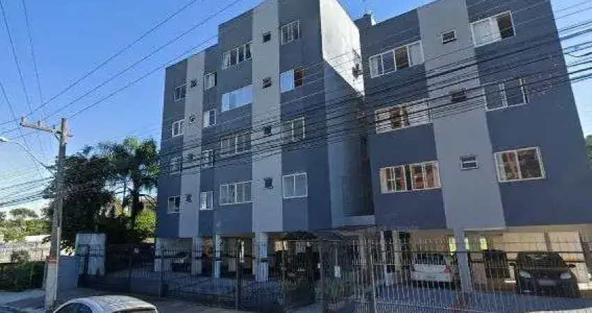 Apartamento com 02 dormitórios, sala, cozinha, banehiro e garagem.