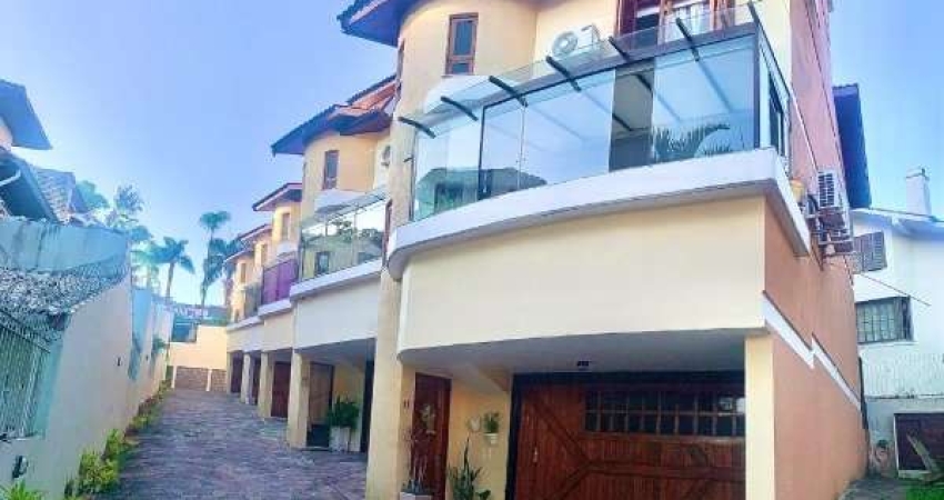 Casa em condomínio fechado com 3 quartos para alugar no Ipanema, Porto Alegre 