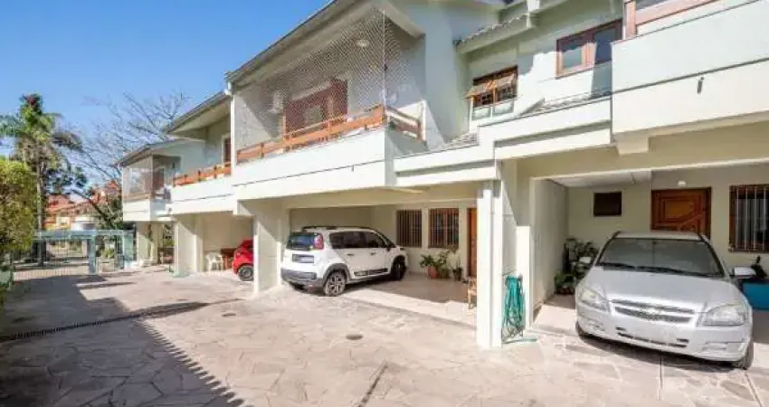 Casa em condomínio fechado com 3 quartos à venda no Pedra Redonda, Porto Alegre 