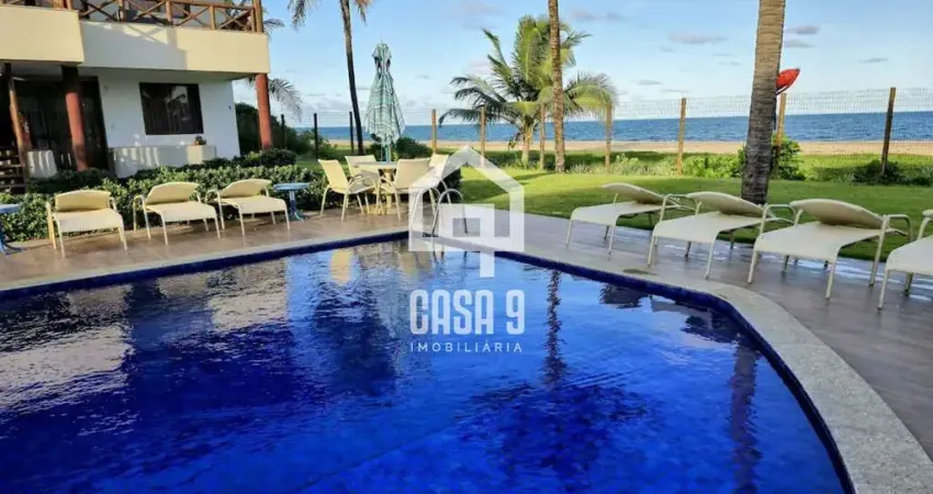 Apartamento mobiliado a venda com 2 suítes pé na areia em Itacimirim Bahia