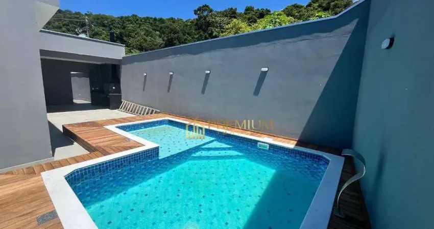 Casa com 3 dormitórios à venda, 131 m² por R$ 900.000 - Massaguaçu - Caraguatatuba/SP