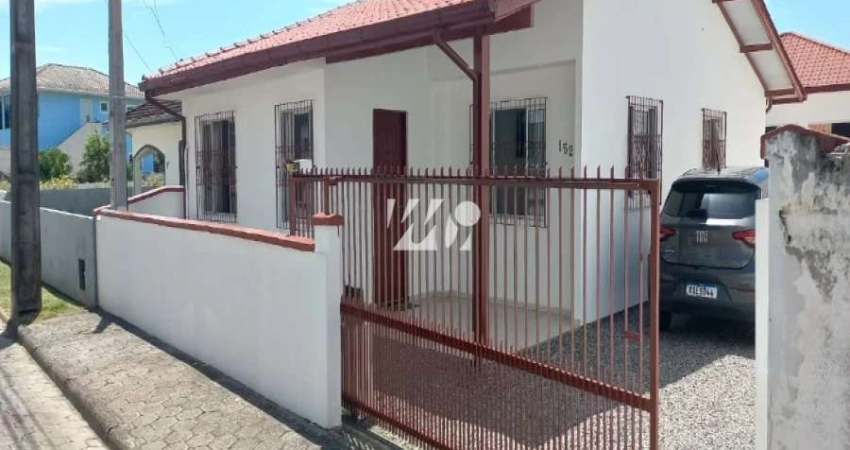 Terreno com duas Casas uma com 2 dormitórios