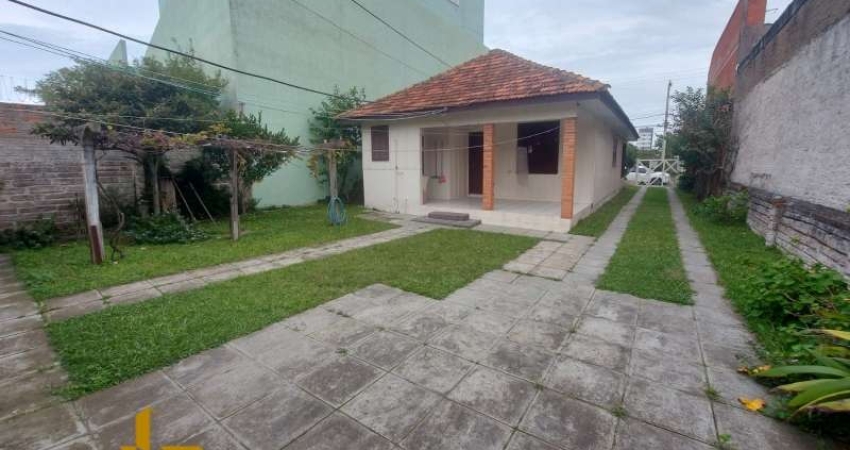 Casa 4 Dormitórios à venda no Bairro Centro com 160 m² de área privativa - 2 vagas de garagem