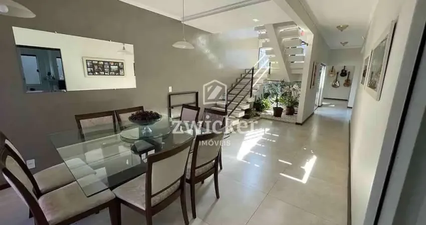 Lindo Sobrado com 5 Suítes e Área de Lazer Completa na Região Alta da Cidade!