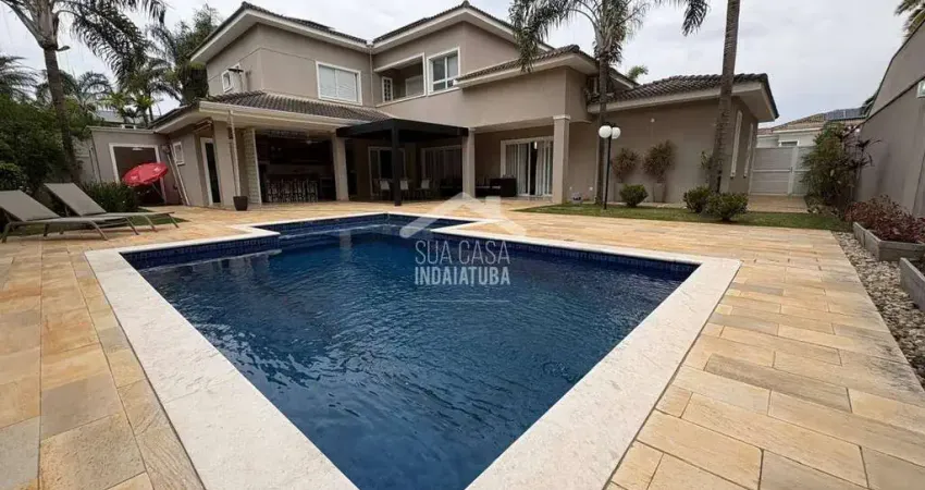Sobrado 4 suítes, escritório e piscina em condomínio de alto padrão
