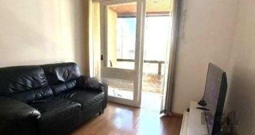 Apartamento no Centro de 1 dormitório, sacada e vaga