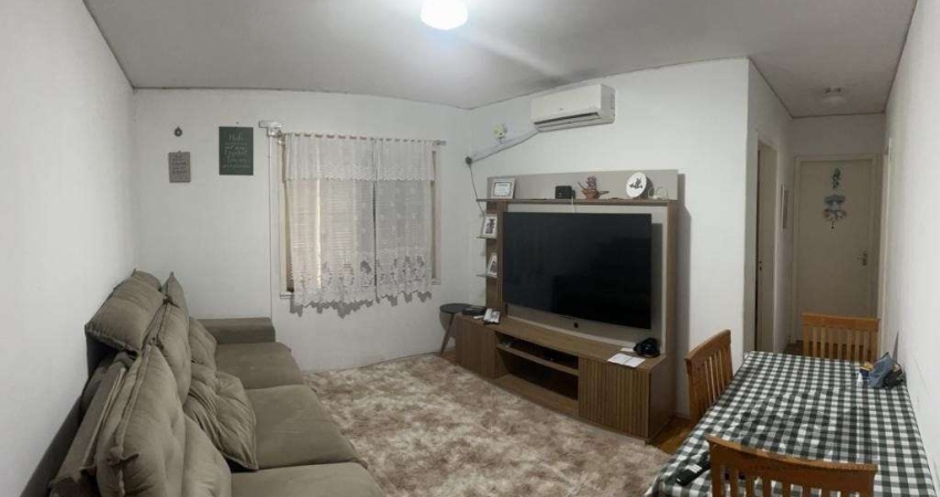 Apartamento de 2 dormitórios, living, cozinha, área de serviço e banheiro social