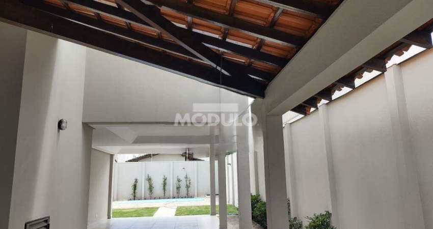 Casa residencial para locação, bairro Jardim Karaiba com 3 quartos