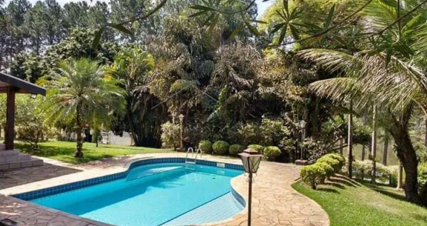 Casa com 3 dormitórios, 380 m² - Condomínio Chácaras Cataguá - Taubaté/SP.