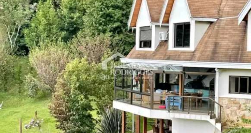 Casa com 6 suítes, 550 m² - Condomínio Pedra do Fogo - Campos do Jordão/SP