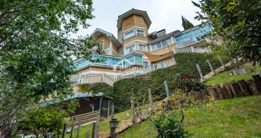 Casa com 5 suítes, 950 m² - alto do capivari - campos do jordão/sp