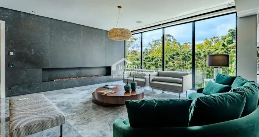 Casa à venda com 5 suítes no condomínio reserva figueiredo em campos do jordão/sp.