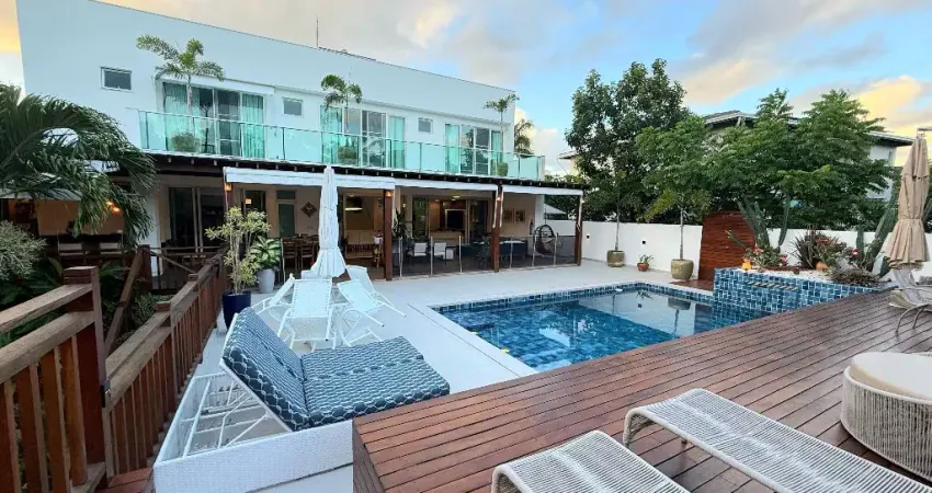 Casa a venda em busca vida com 4 suites piscina área gourmet em condominio fechadp