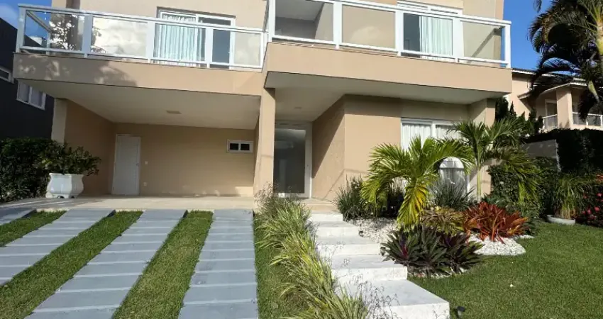 Casa a venda em alphaville litoral norte 1 com 5 suites piscina e área gourmet