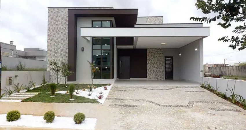 Casa Térrea 3 Suítes, área gourmet com churrasqueira a carvão, piscina, banheiro externo, área de serviço, despensa, 4 vagas (2 cobertas), Lote 275m2