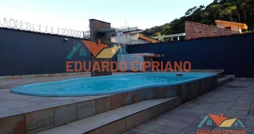 Casa com 3 dormitórios à venda, 111 m² por R$ 690.000,00 - Massaguaçu - Caraguatatuba/SP