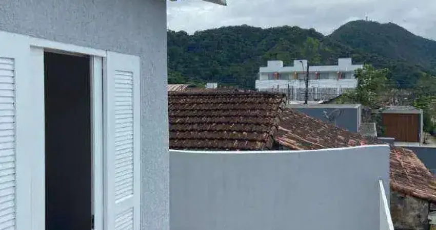 Casa com 3 dormitórios à venda, 129 m² em Caraguatatuba/SP